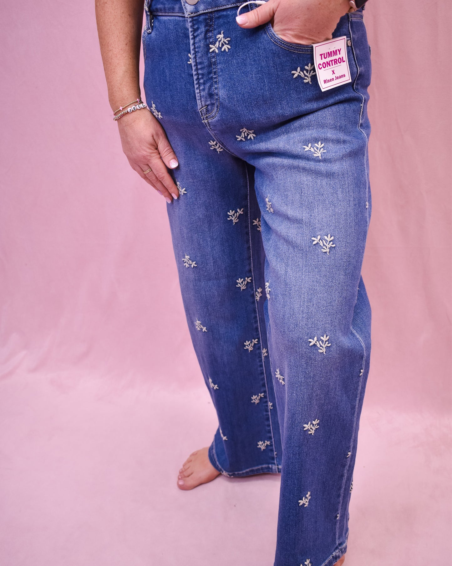Floral embroidered jeans by risen denim. Wide leg style, ankle length.