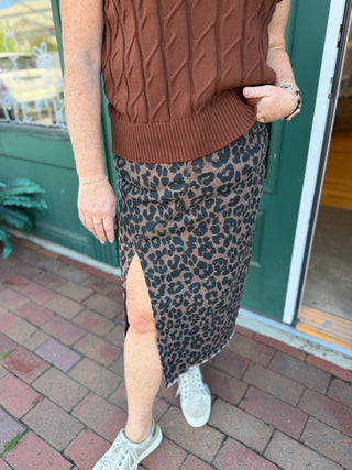 A leopard print denim midi skirt with front side slit