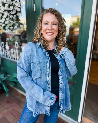 a long sleeve vintage denim washed button down shacket