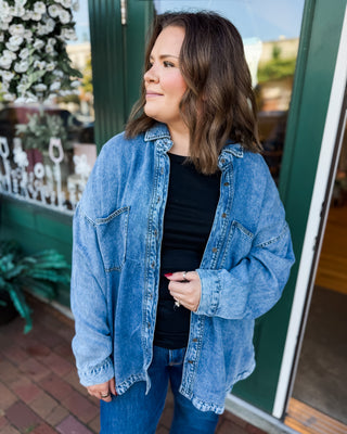 a long sleeve vintage denim washed button down shacket