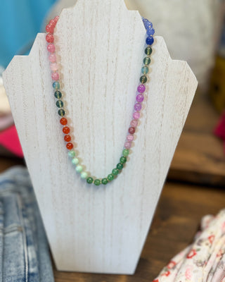 a dark multi colored beaded necklace