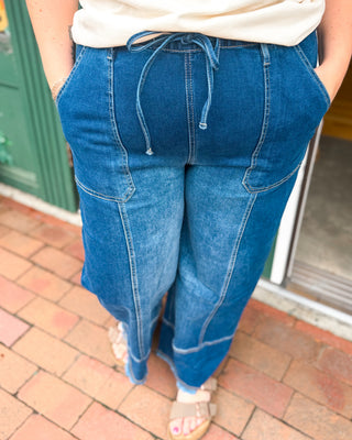 Denim Done Easy Drawstring Raw Hem Wide Leg Jeans in a dark wash