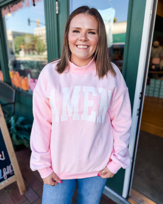 a pullover mock neck reversible sweatshirt with the words WWJD and Amen
