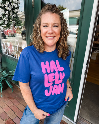 hallelujah printed in pink puff ink on an indigo blue tee