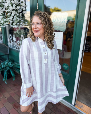 a long sleeve striped drop hem shift dress