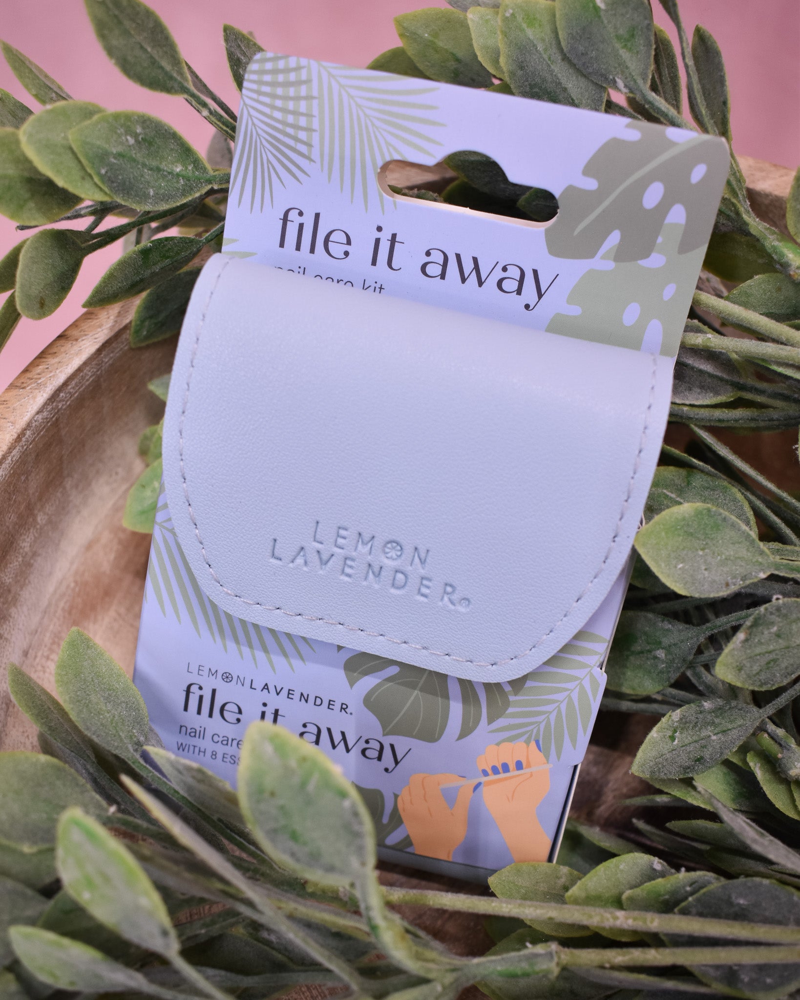 Lemon Lavender nail care kit with packaging on a leafy background