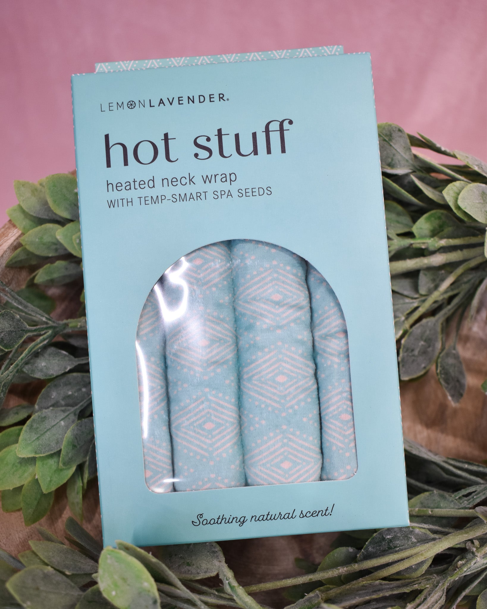 Lemon Lavender heated neck wrap packaging with greenery in the background