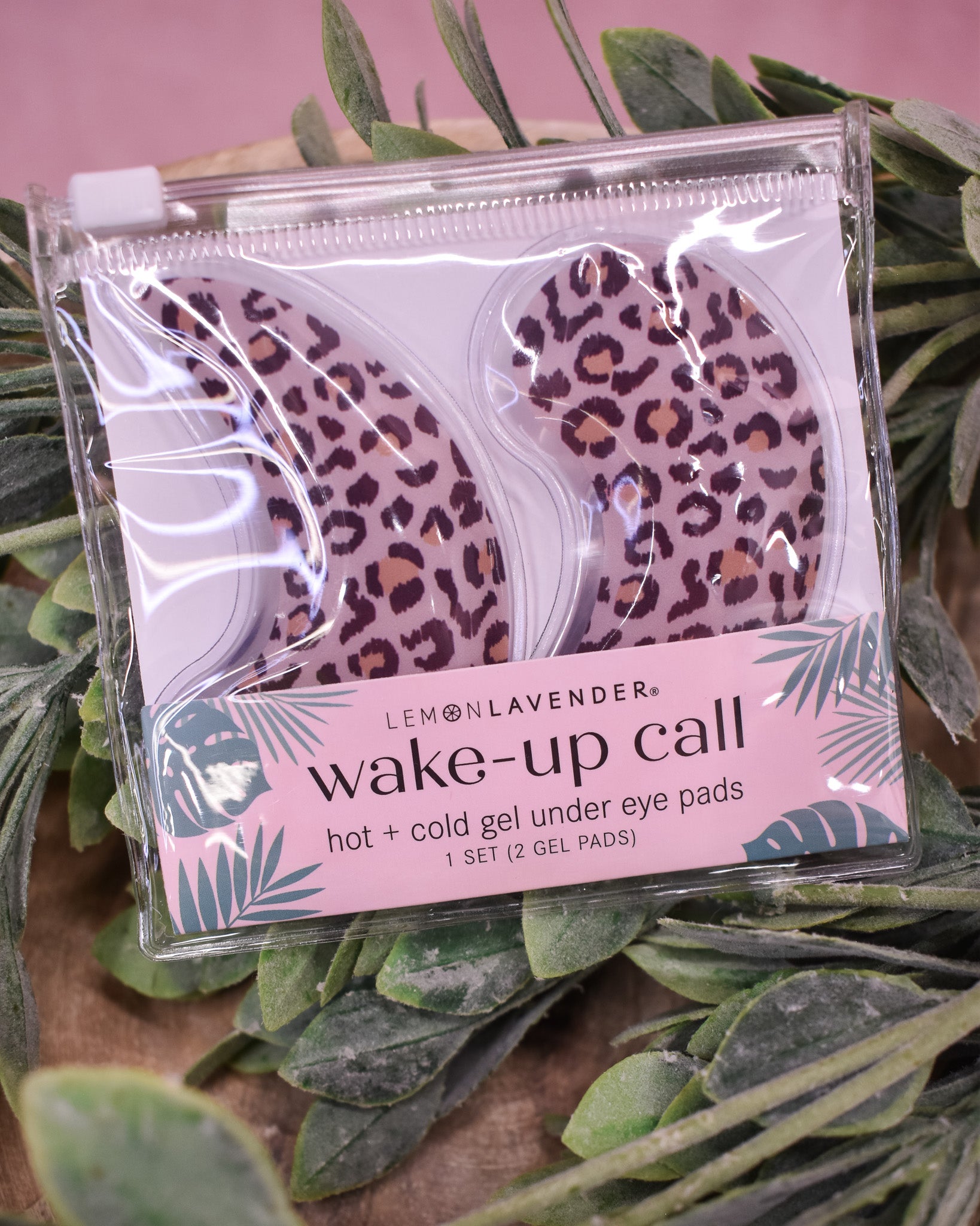 Pack of Lemon Lavender wake-up call gel under eye pads on a leafy background