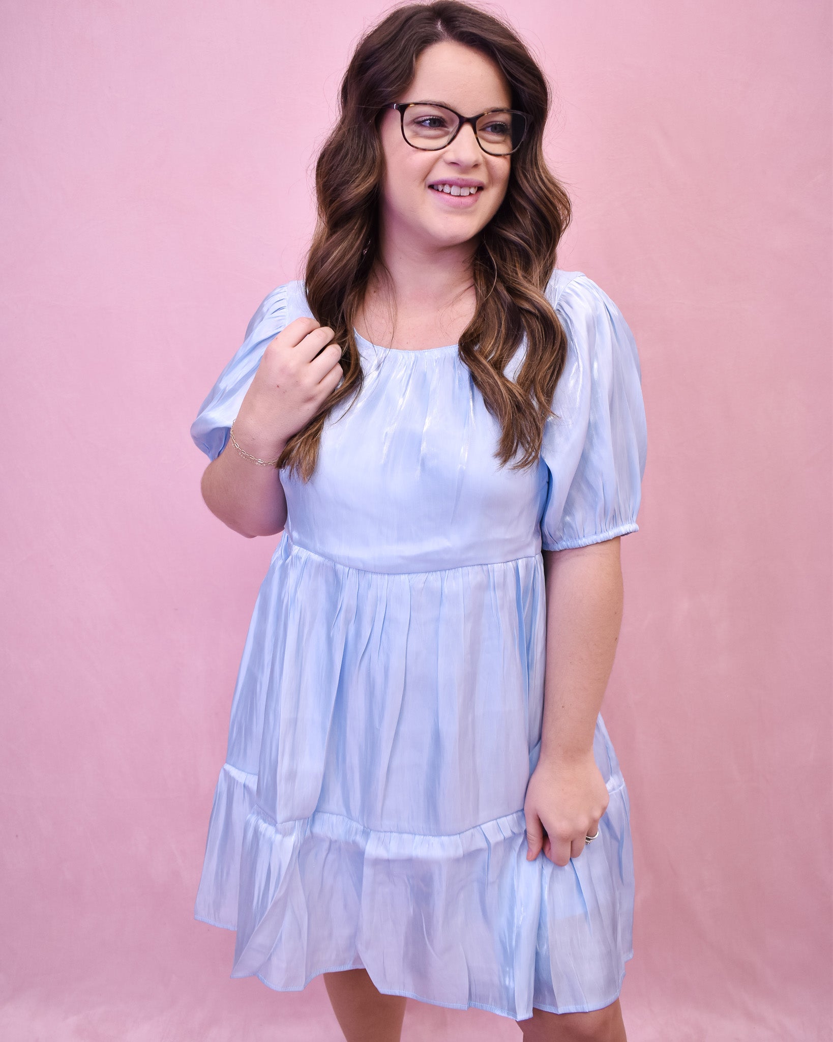 a satin tiered mini dress in a powder blue