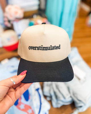 overstimulated embroidered on a canvas hat