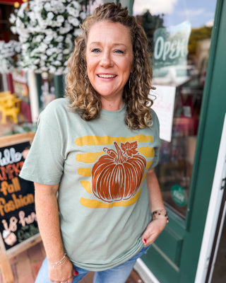 A striped pumpkin sage colored graphic tee