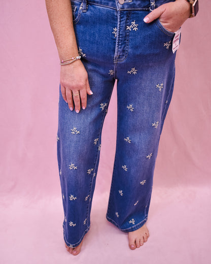 Floral embroidered jeans by risen denim.  Wide leg style, ankle length.