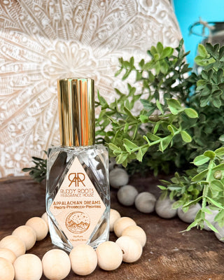 a clear bottle of perfume