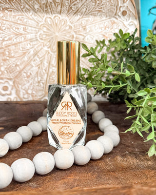 a clear bottle of perfume