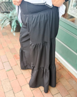 Flowy wide leg pull-on pants featuring feminine tiered ruffle details and lightweight polyester fabric. The perfect statement pants for vacations, brunch, special occasions, and effortless everyday style.