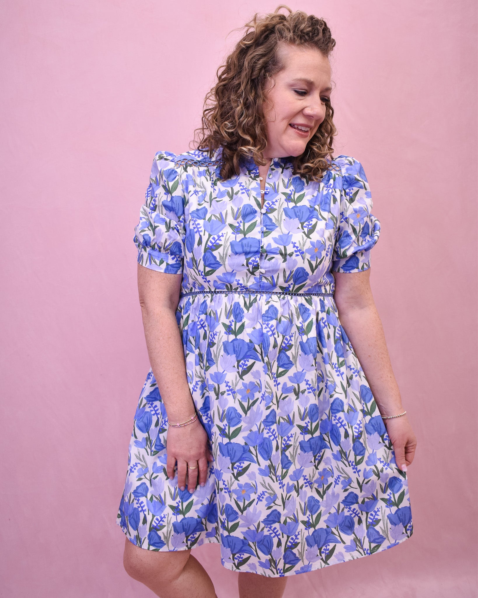 a colorful floral mini dress