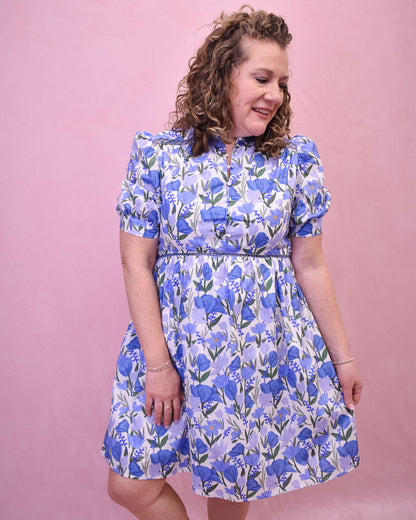 a colorful floral mini dress