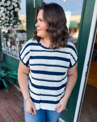a short sleeve crochet navy striped sweater with scalloped details