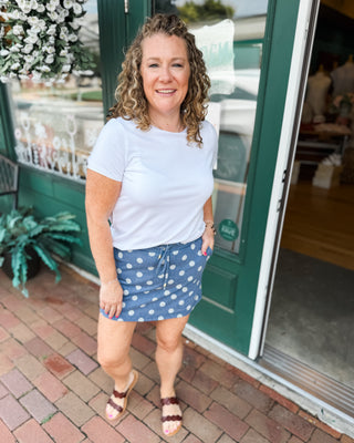 a polka dot mini skirt with shorts underneath