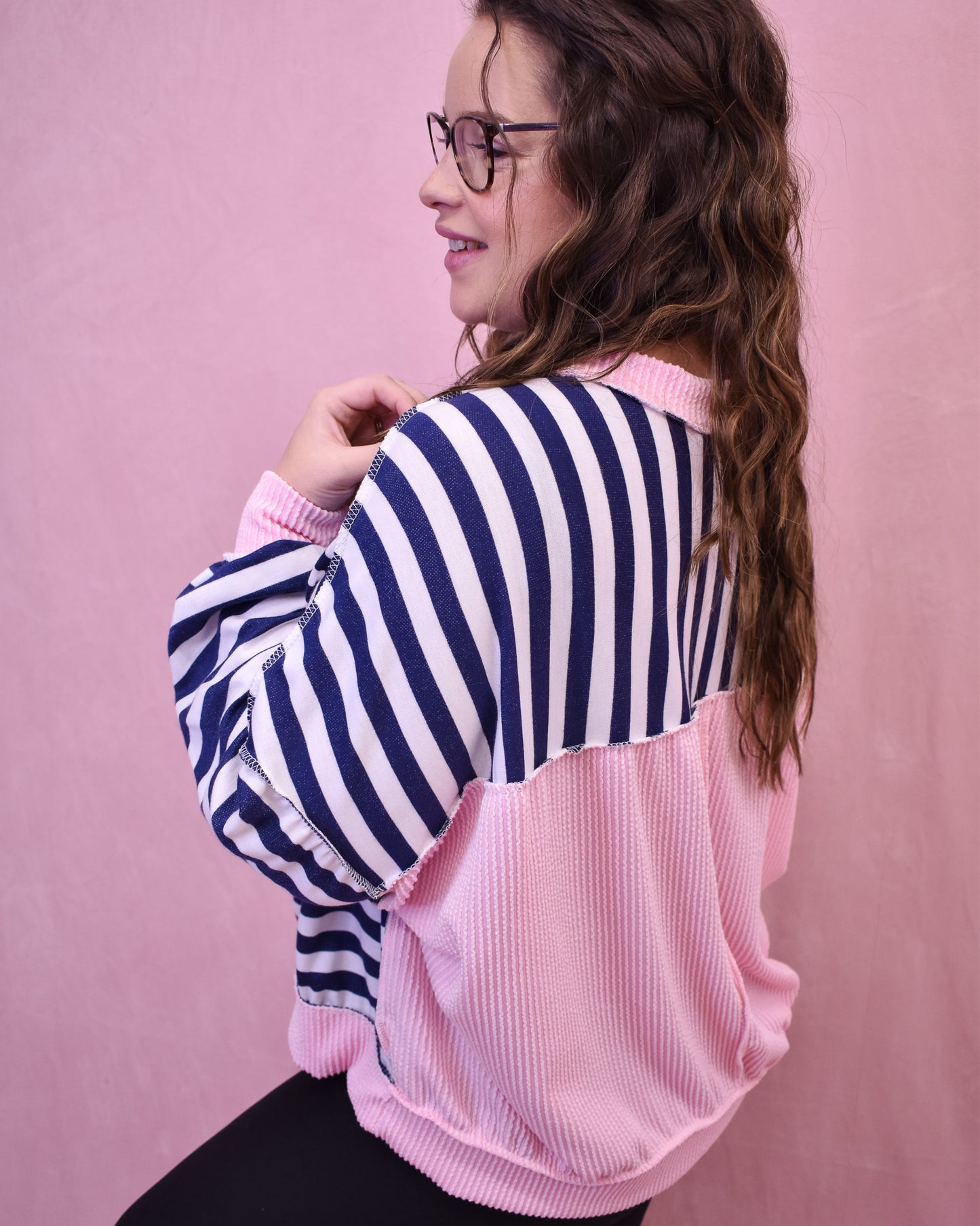 long sleeve navy striped top with ribbed details