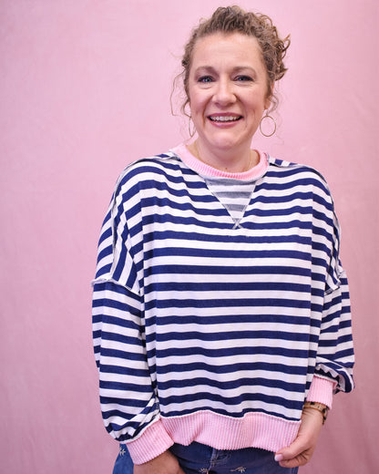 long sleeve navy striped top with ribbed details