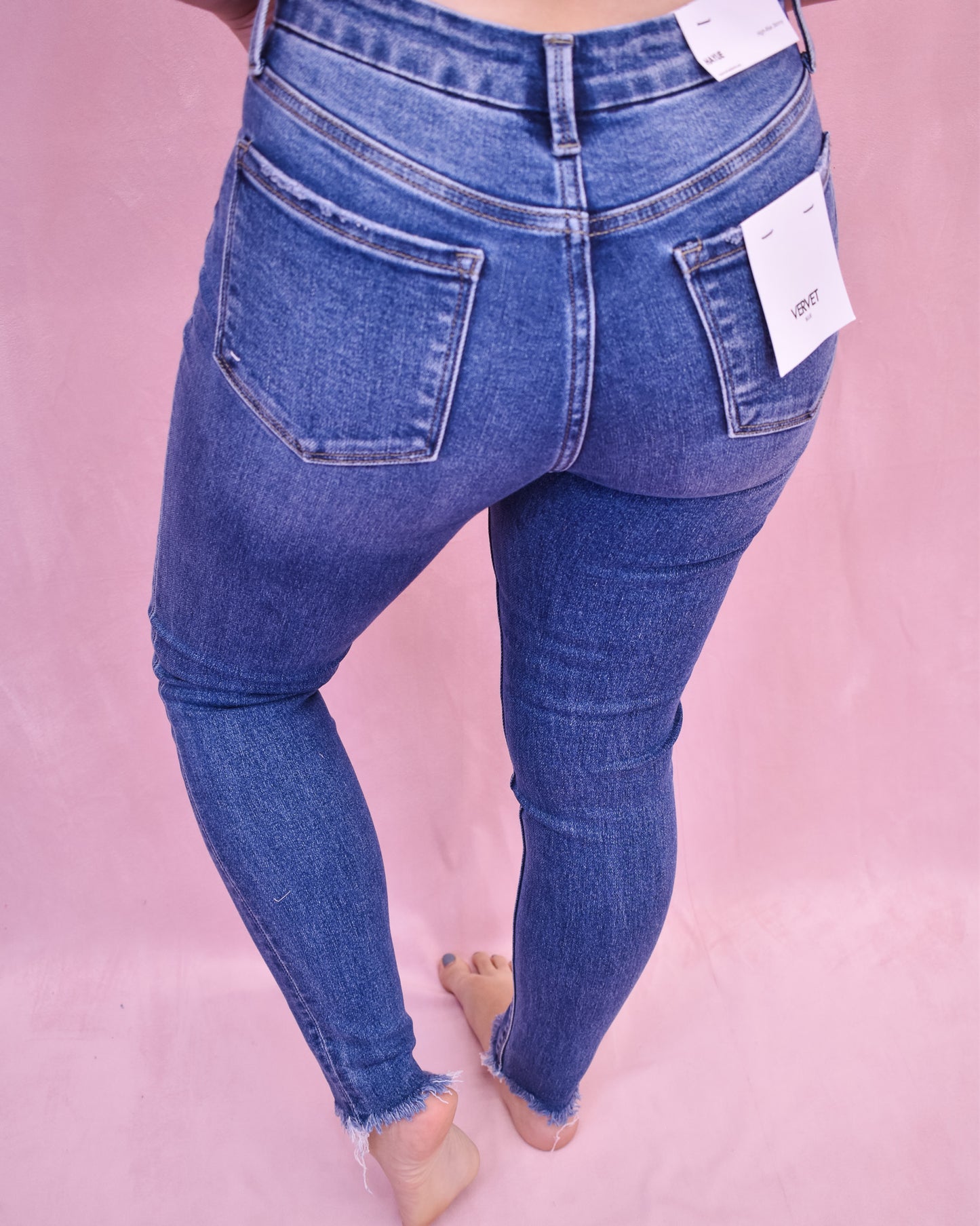 Vervet High Rise Uneven Raw Hem Skinny
