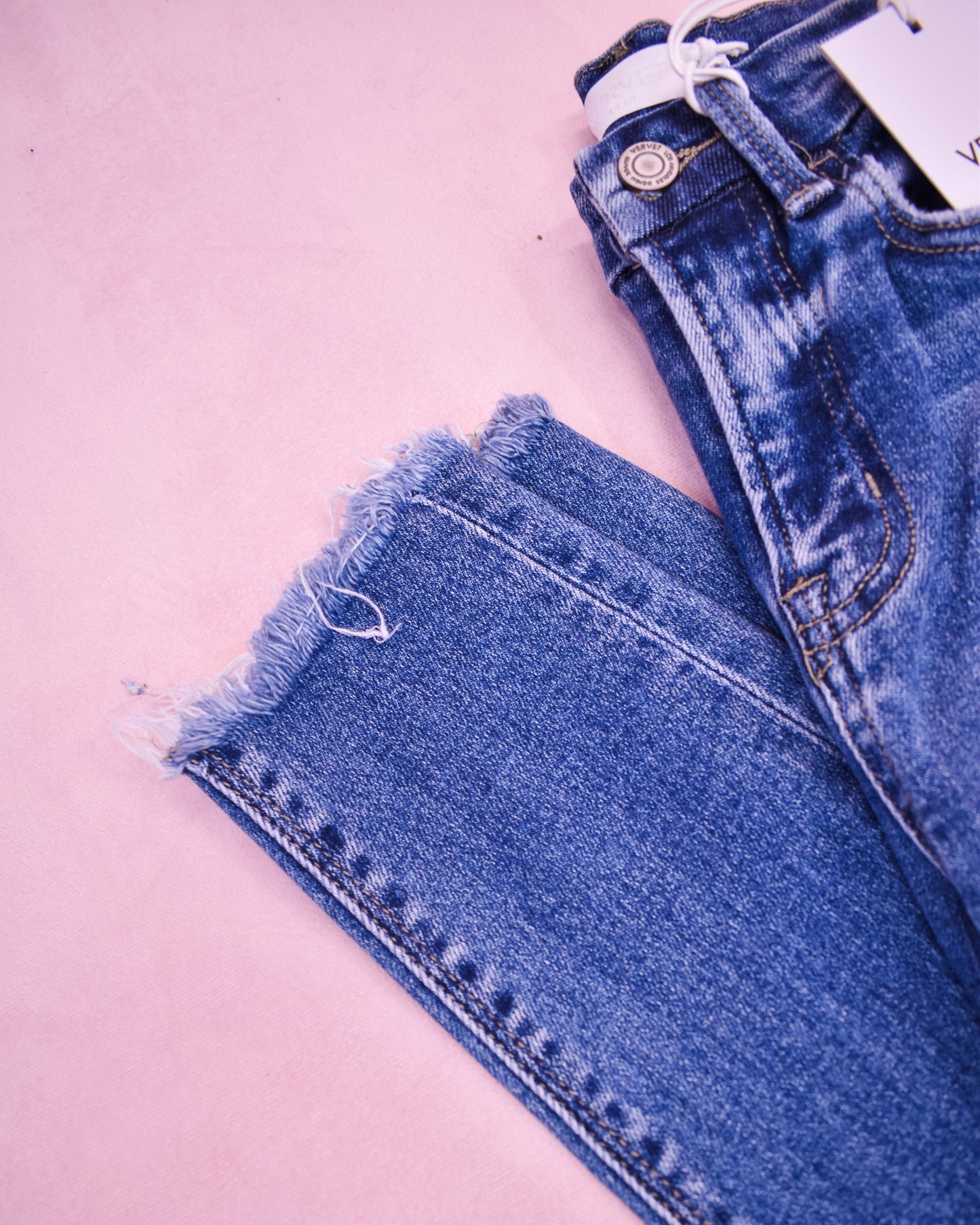 Vervet High Rise Uneven Raw Hem Skinny