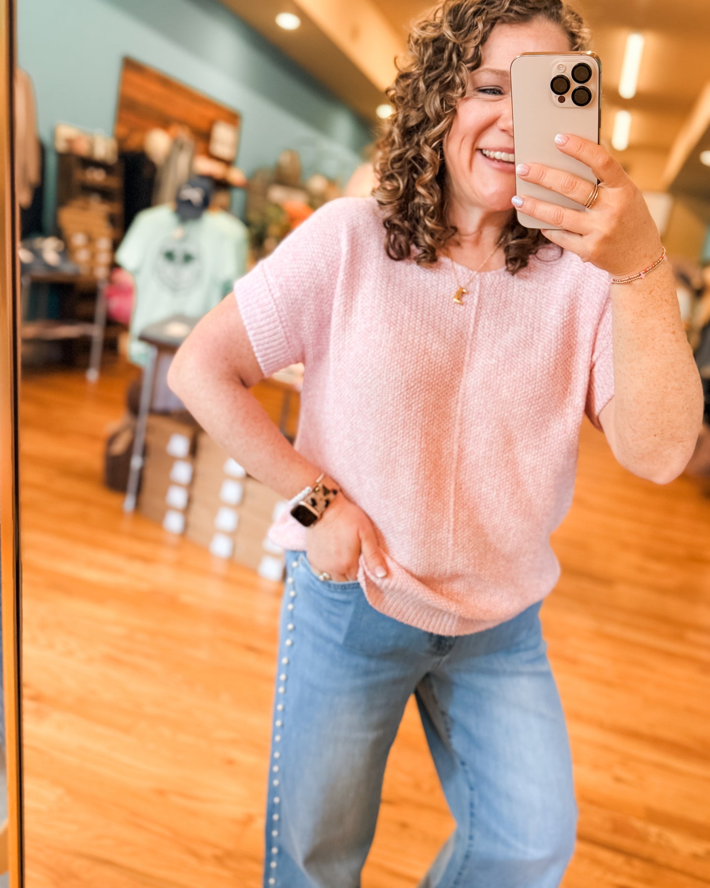 A lightweight pink sweater with short sleeves